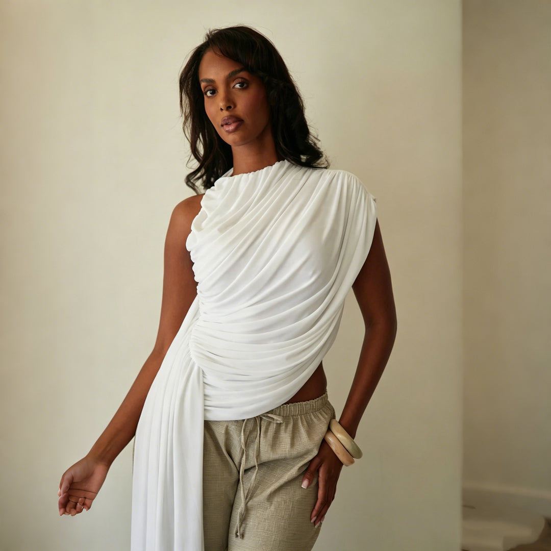 Damer Elegant asymmetrisk topp med draperingar Mirla-Eva Jonsson