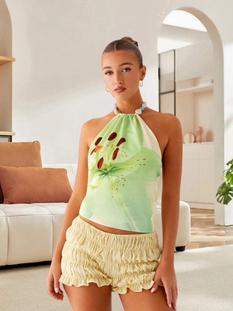 Damer Elegant blommönster topp med halterneck-utskärning och smickrande passform Eva Jonsson-Eva Jonsson