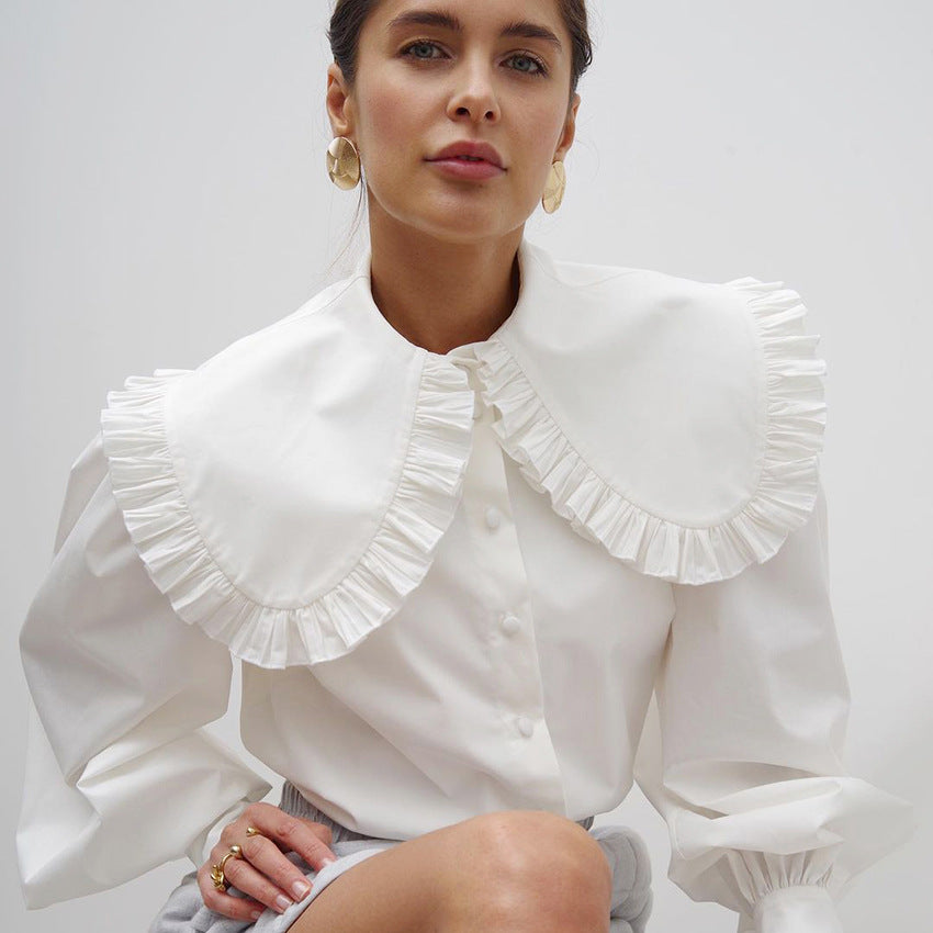 Damer Elegant blus med voluminösa ärmar och volangkant Mirla-Eva Jonsson