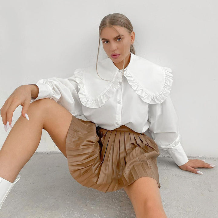 Damer Elegant blus med voluminösa ärmar och volangkant Mirla-Eva Jonsson