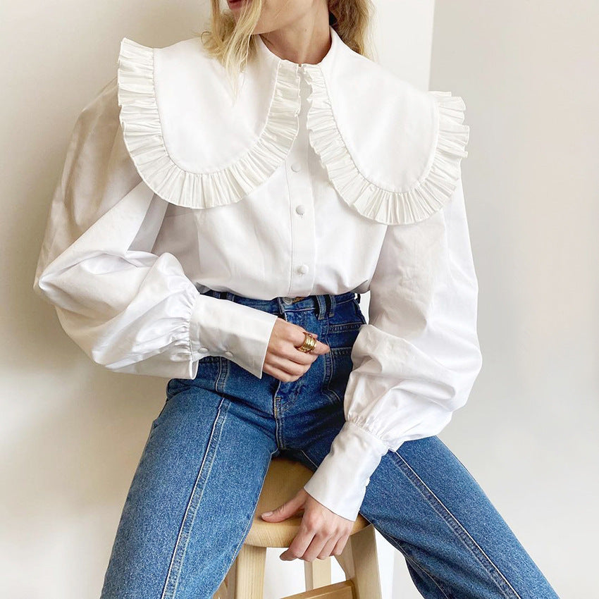 Damer Elegant blus med voluminösa ärmar och volangkant Mirla-Eva Jonsson