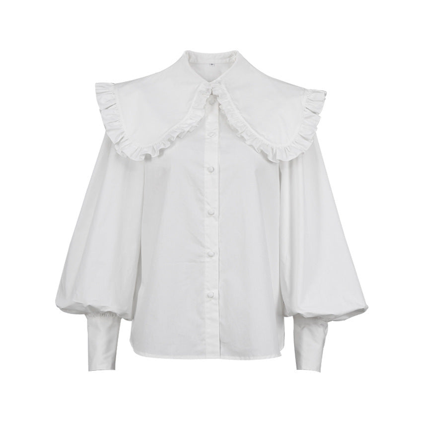 Damer Elegant blus med voluminösa ärmar och volangkant Mirla-Eva Jonsson