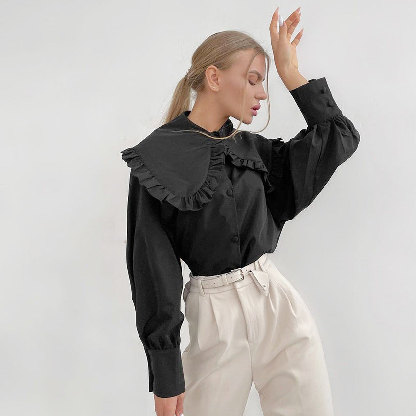 Damer Elegant blus med voluminösa ärmar och volangkant Mirla-Eva Jonsson