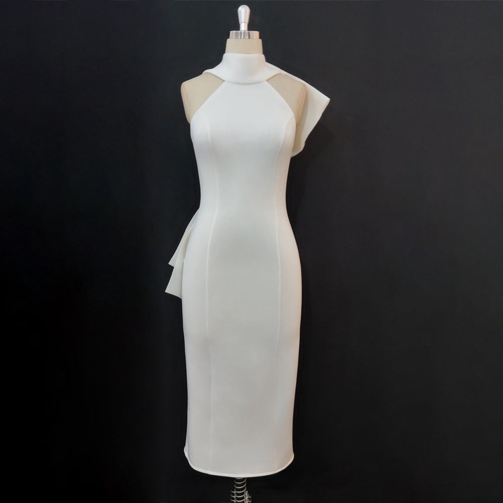 Damer Elegant bodycon-klänning med asymmetrisk design och svängande detalj Mirla-Eva Jonsson