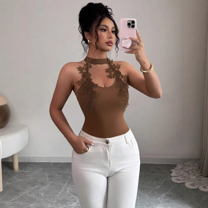 Damer Elegant bodysuit med blommig spetsdetalj Mirla-Eva Jonsson