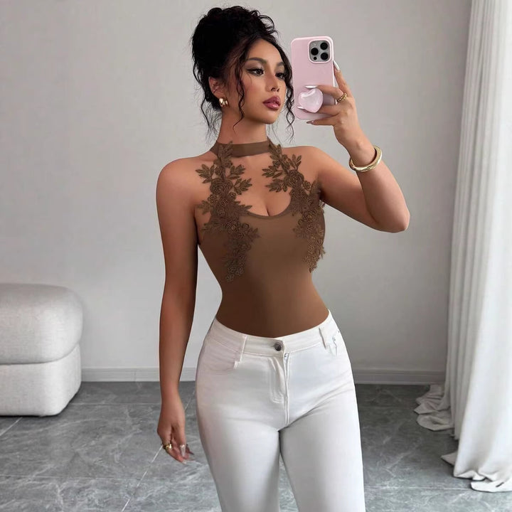 Damer Elegant bodysuit med blommig spetsdetalj Mirla-Eva Jonsson