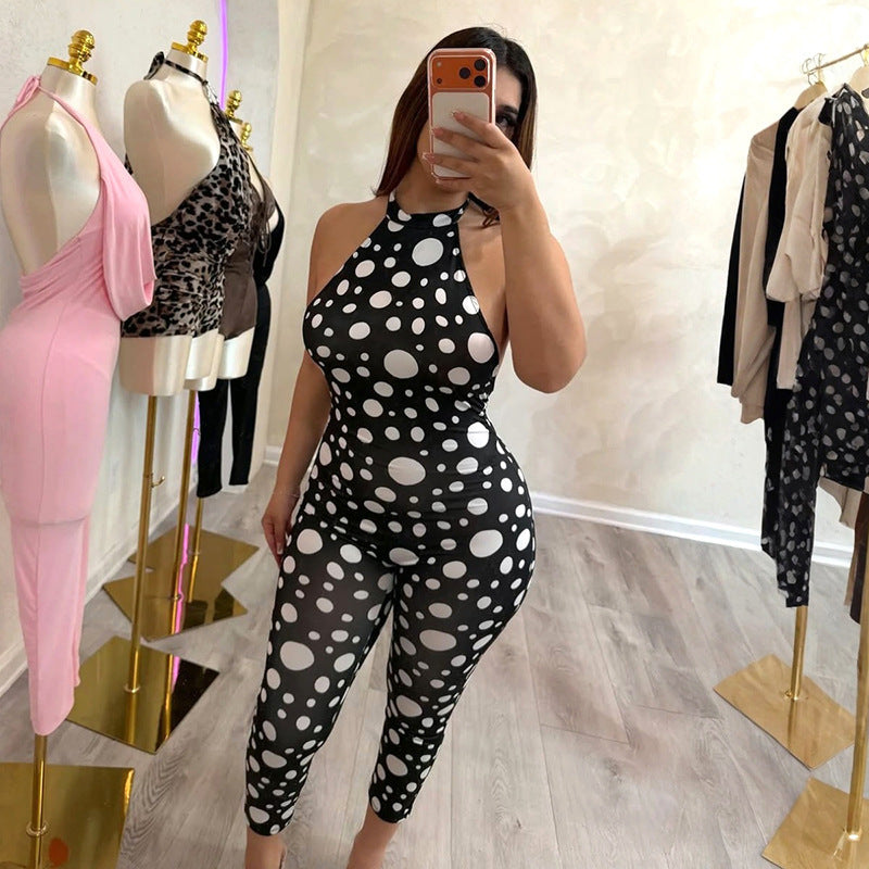 Damer Elegant bodysuit med prickar och djupt ryggparti Mirla-Eva Jonsson
