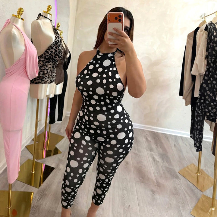 Damer Elegant bodysuit med prickar och djupt ryggparti Mirla-Eva Jonsson