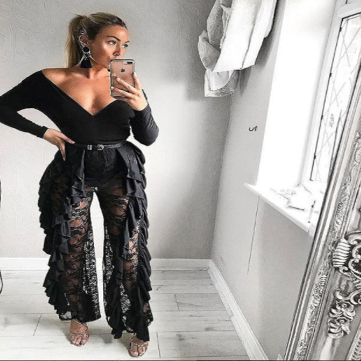 Damer Elegant bred spetsbyxor med volangdetaljer och hög midja Mirla-Eva Jonsson