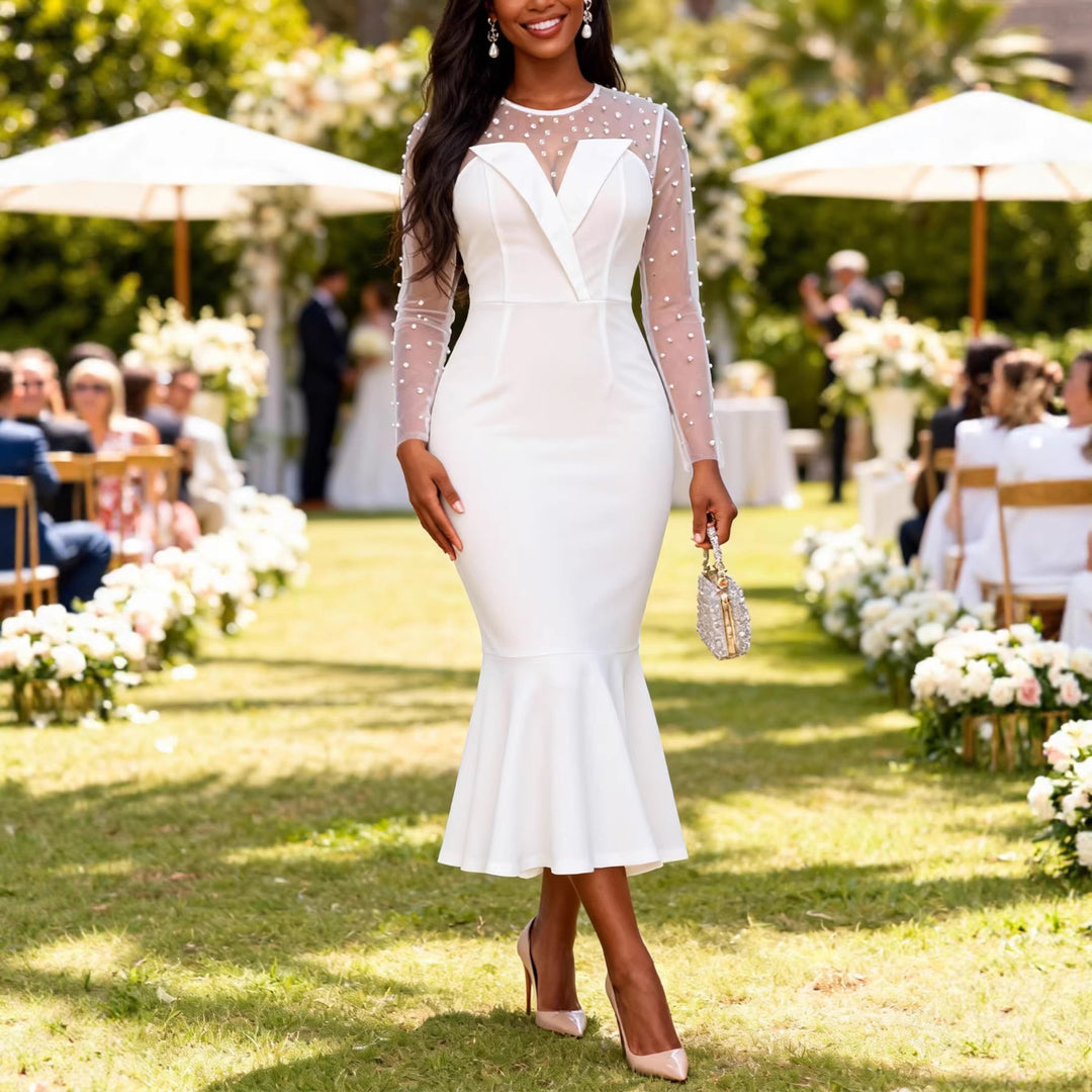 Damer Elegant brudklänning med transparenta puffärmar och midjeband Mirla-Eva Jonsson