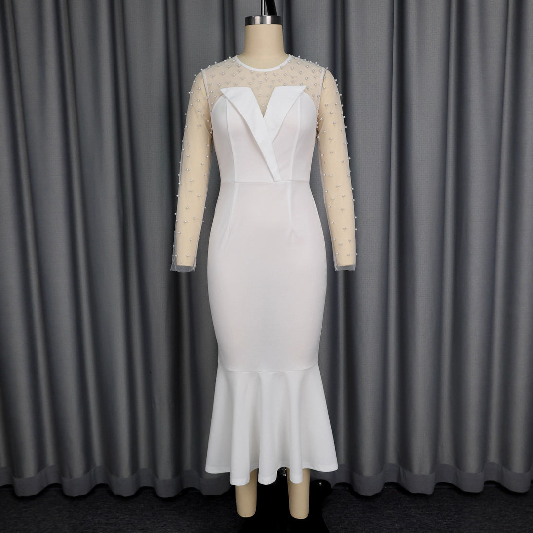 Damer Elegant brudklänning med transparenta puffärmar och midjeband Mirla-Eva Jonsson