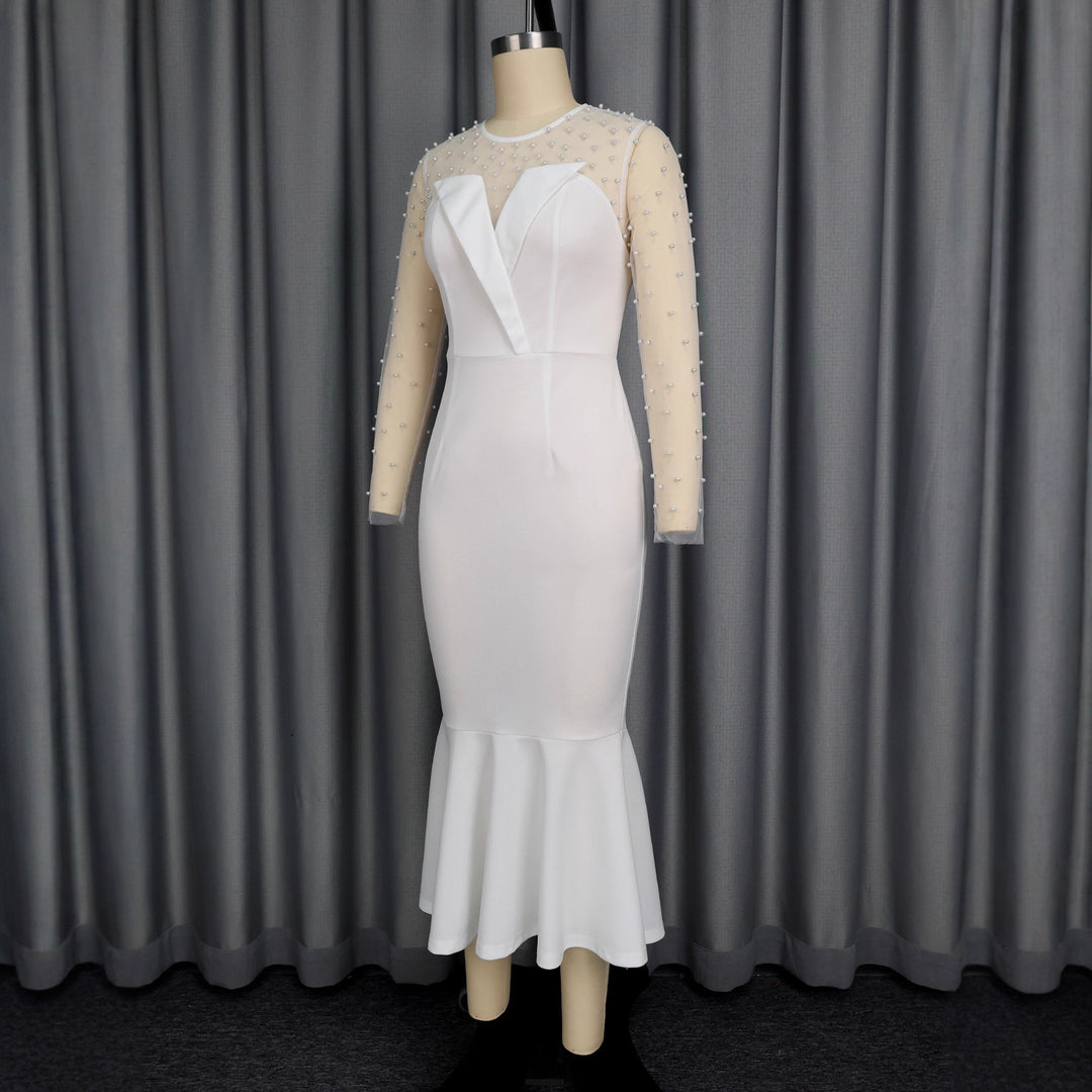Damer Elegant brudklänning med transparenta puffärmar och midjeband Mirla-Eva Jonsson