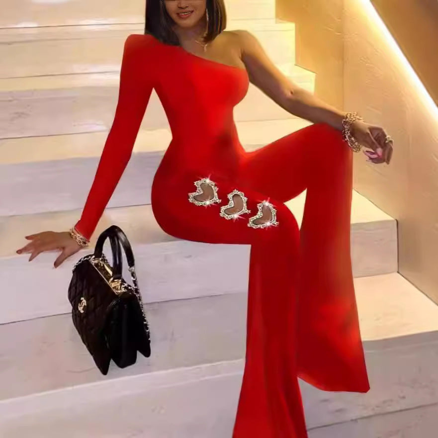 Damer Elegant en sida Flare jumpsuit med dekorativa utsmyckningar Mirla-Eva Jonsson