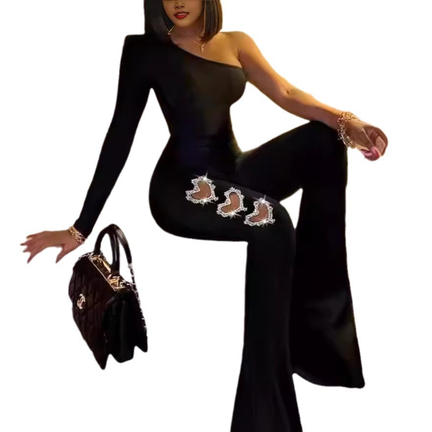 Damer Elegant en sida Flare jumpsuit med dekorativa utsmyckningar Mirla-Eva Jonsson