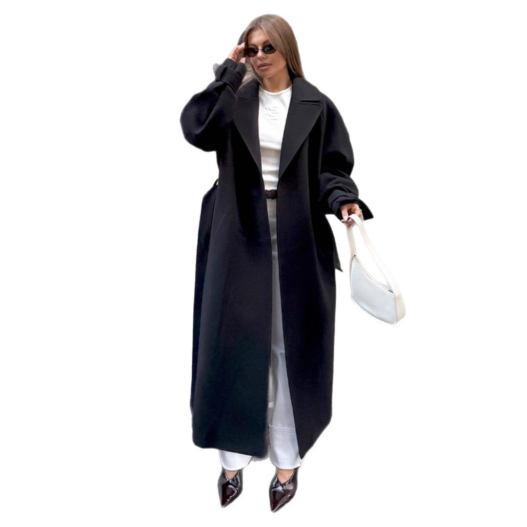 Damer Elegant, figursydd ullkappa med bälte Mirla-Eva Jonsson