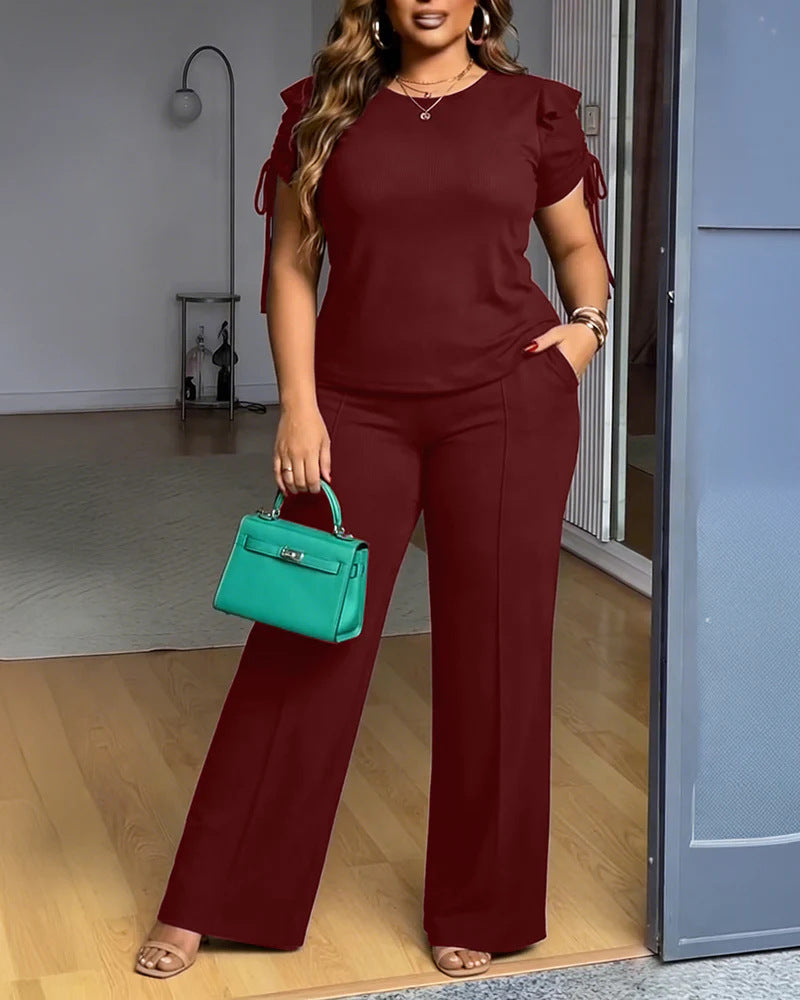 Damer Elegant fritidsdräktset med volangdetaljer och vid passform Mirla-Eva Jonsson