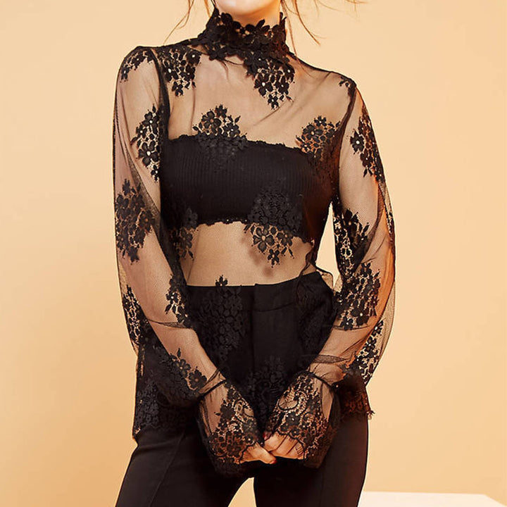 Damer Elegant genomskinlig blus med spetsapplikationer Mirla-Eva Jonsson