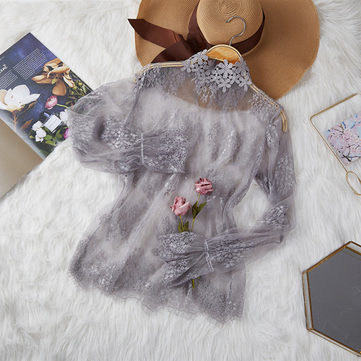 Damer Elegant genomskinlig blus med spetsapplikationer Mirla-Eva Jonsson
