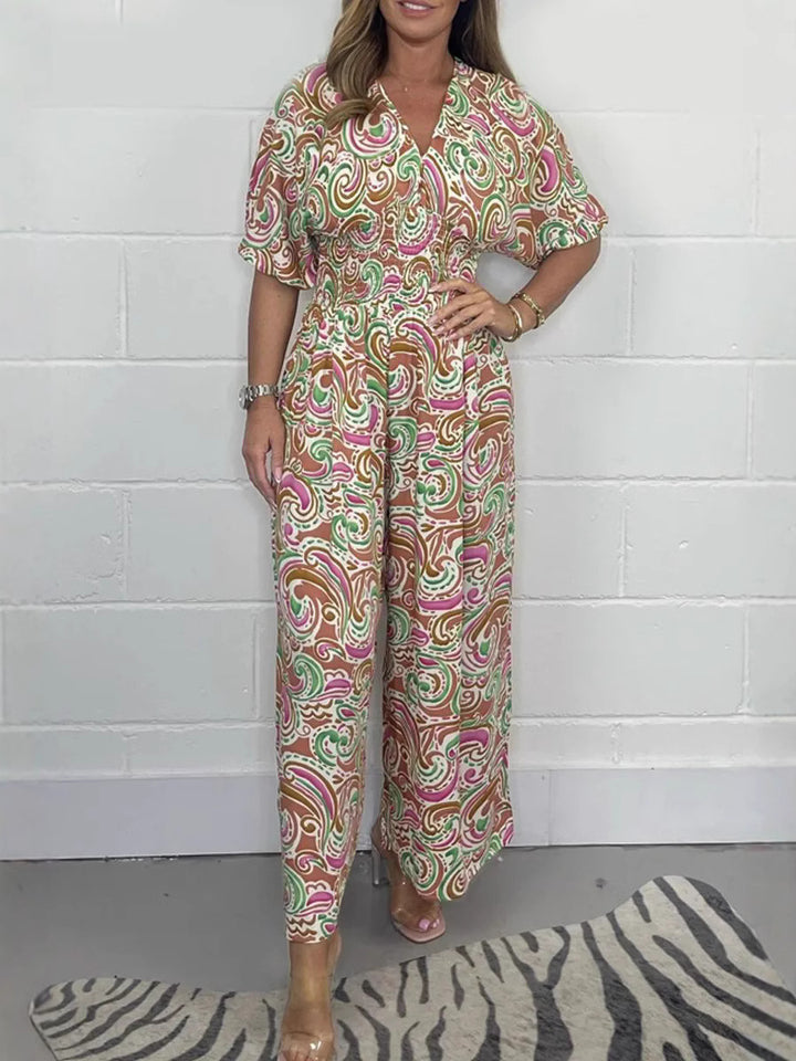 Damer Elegant heldräkt med blommönster och moderna detaljer Mirla-Eva Jonsson
