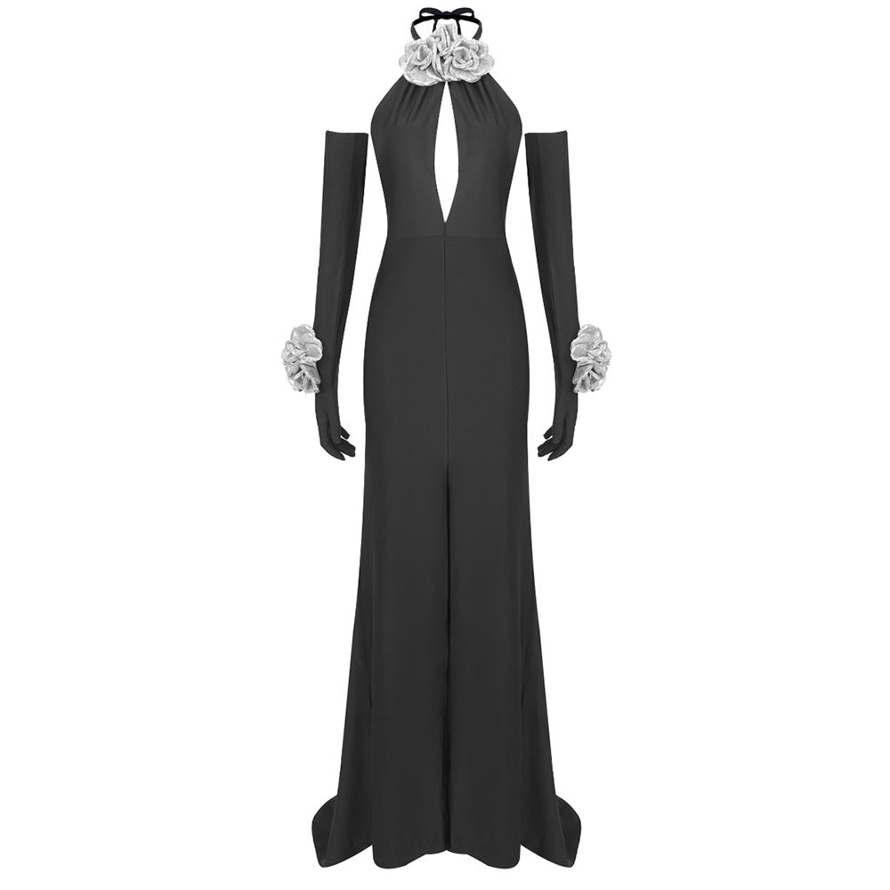 Damer Elegant jumpsuit med blommiga accenter och djup V-ringning Mirla-Eva Jonsson