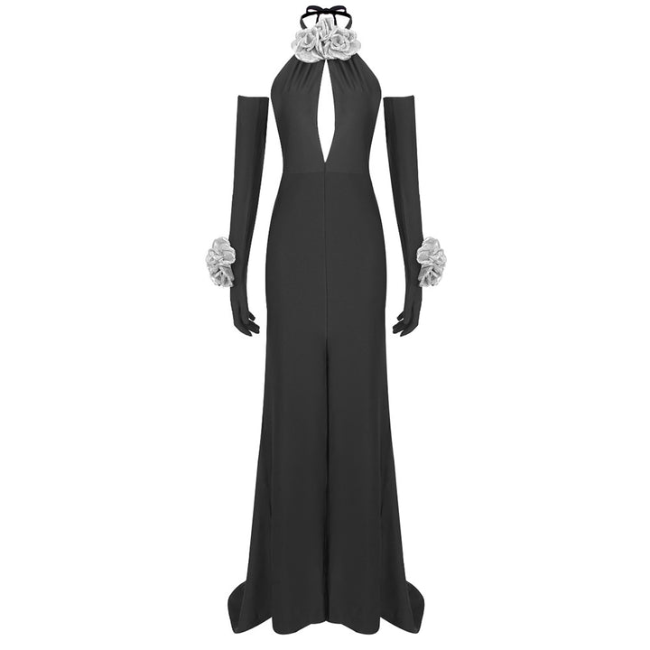 Damer Elegant jumpsuit med blommiga accenter och djup V-ringning Mirla-Eva Jonsson