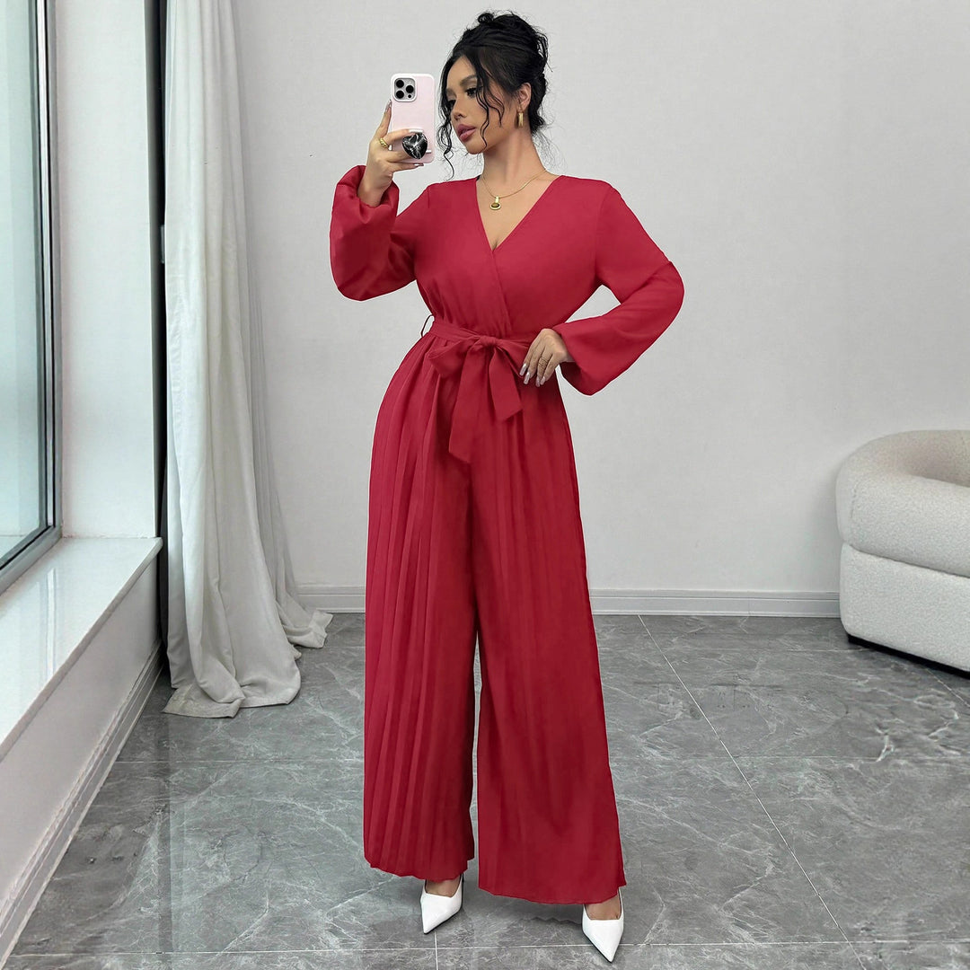 Damer Elegant jumpsuit med midjejusterbart bälte och plisserad skärning Mirla-Eva Jonsson