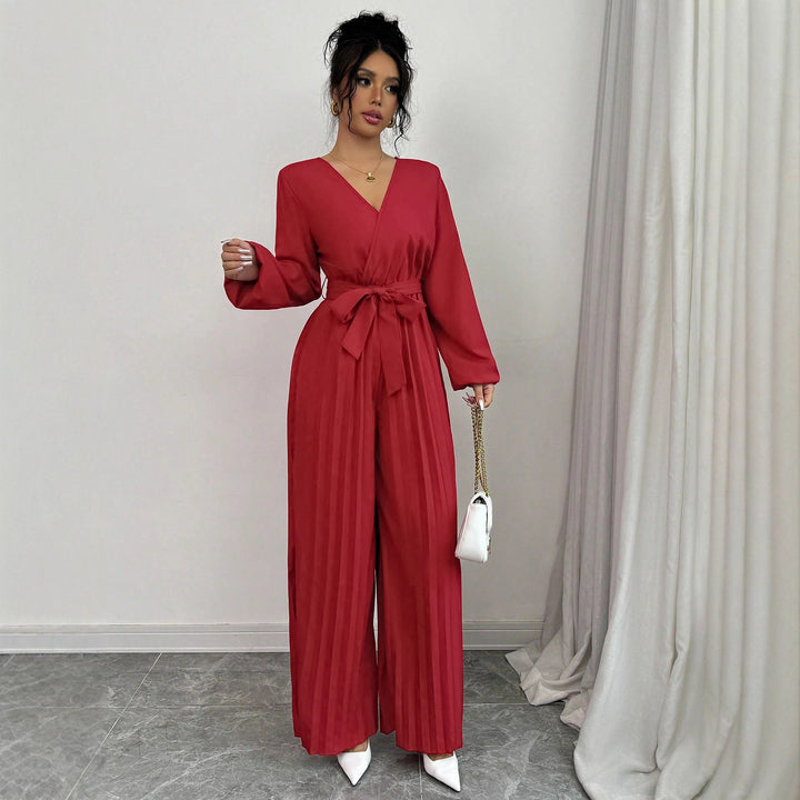 Damer Elegant jumpsuit med midjejusterbart bälte och plisserad skärning Mirla-Eva Jonsson