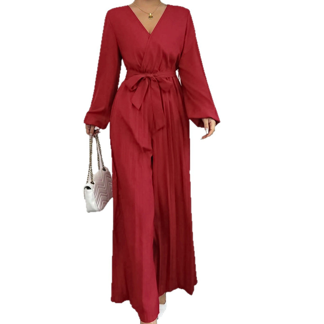 Damer Elegant jumpsuit med midjejusterbart bälte och plisserad skärning Mirla-Eva Jonsson