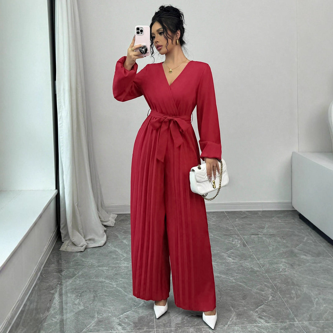 Damer Elegant jumpsuit med midjejusterbart bälte och plisserad skärning Mirla-Eva Jonsson