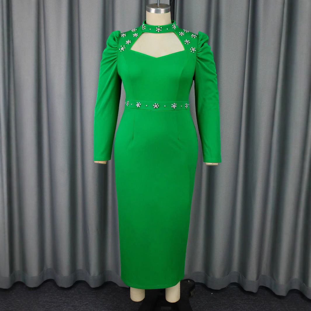 Damer Elegant klänning med asymmetriska cut-outs och blommiga accenter Mirla-Eva Jonsson