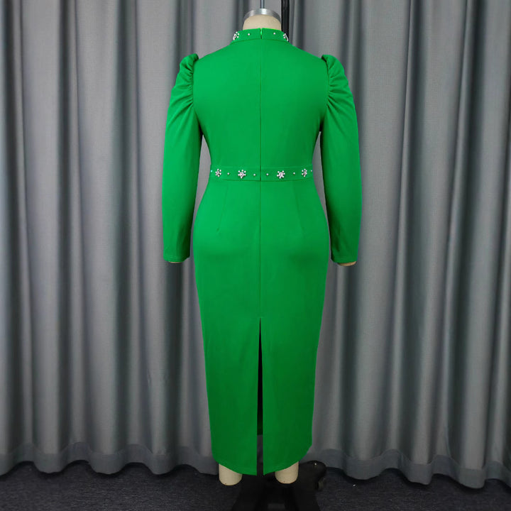 Damer Elegant klänning med asymmetriska cut-outs och blommiga accenter Mirla-Eva Jonsson