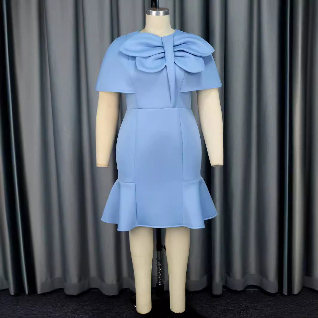 Damer Elegant klänning med voluminös knytning Mirla-Eva Jonsson
