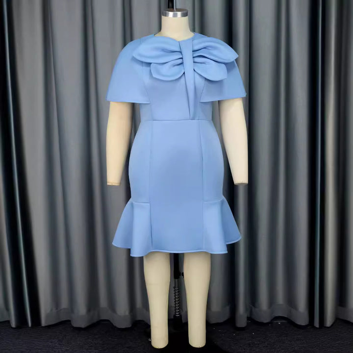 Damer Elegant klänning med voluminös knytning Mirla-Eva Jonsson