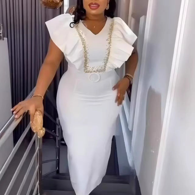 Damer Elegant klänning med voluminösa ruffle detaljer och glamorös accent Mirla-Eva Jonsson