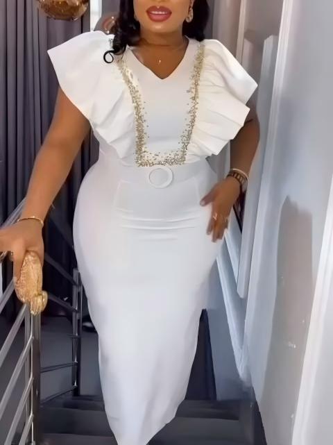 Damer Elegant klänning med voluminösa ruffle detaljer och glamorös accent Mirla-Eva Jonsson