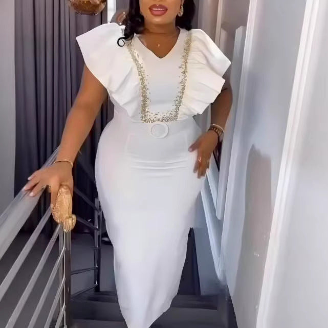 Damer Elegant klänning med voluminösa ruffle detaljer och glamorös accent Mirla-Eva Jonsson