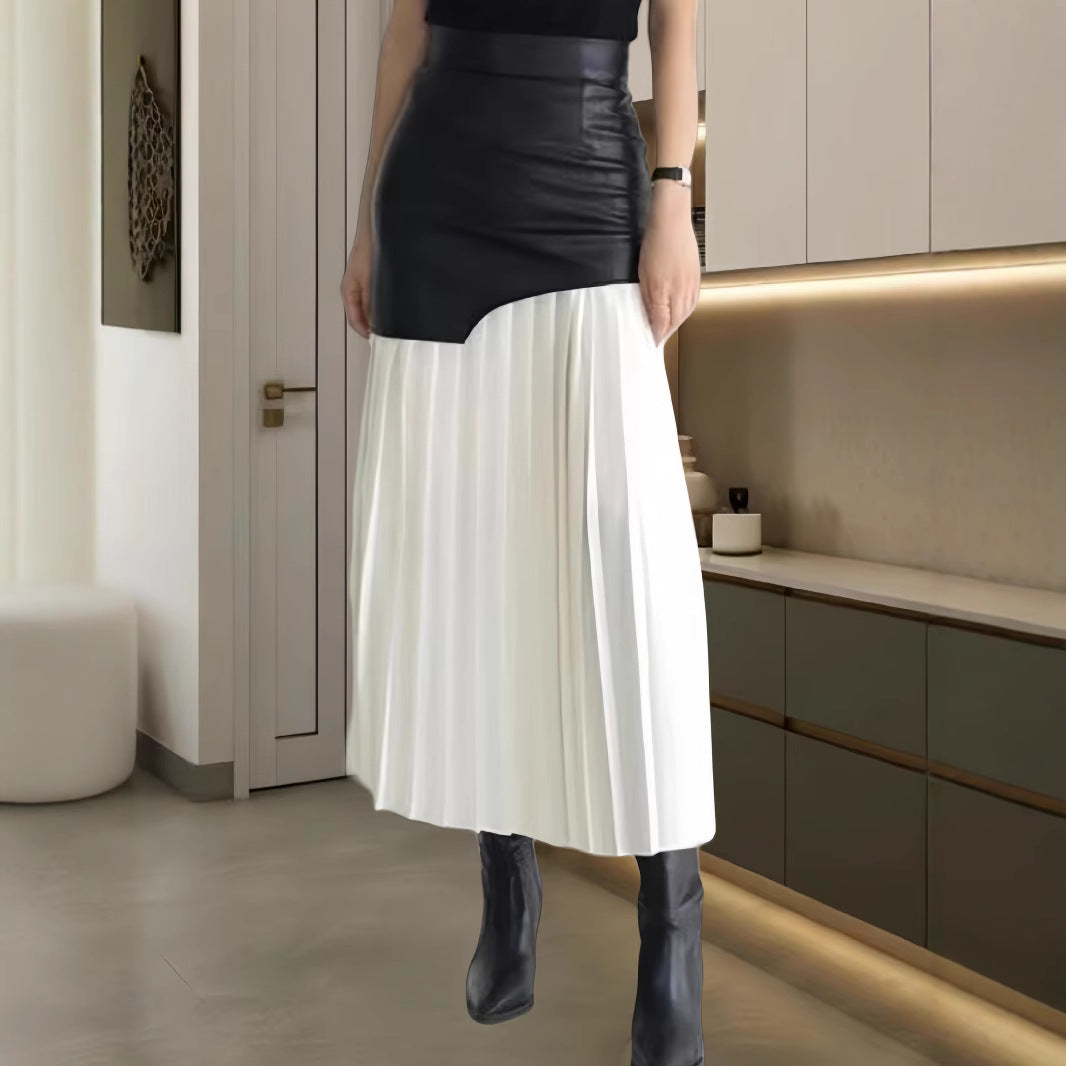 Damer Elegant kombination av fin stickad tröja och chic läderkjol Mirla-Eva Jonsson