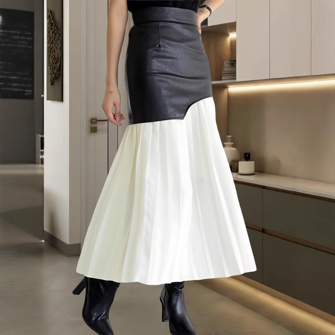Damer Elegant kombination av fin stickad tröja och chic läderkjol Mirla-Eva Jonsson