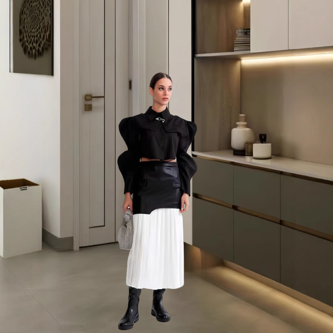 Damer Elegant kombination av fin stickad tröja och chic läderkjol Mirla-Eva Jonsson
