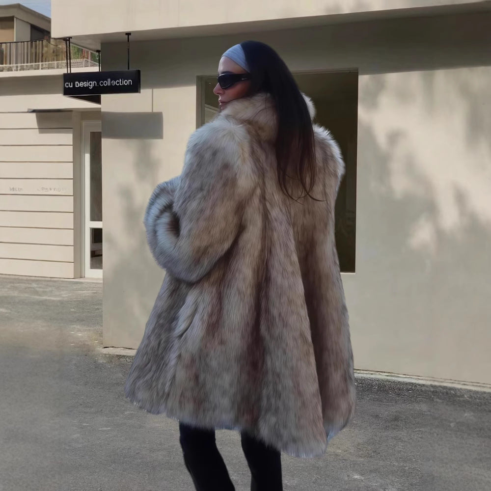 Damer Elegant konstpälsrock med voluminös passform och breda ärmar Mirla-Eva Jonsson