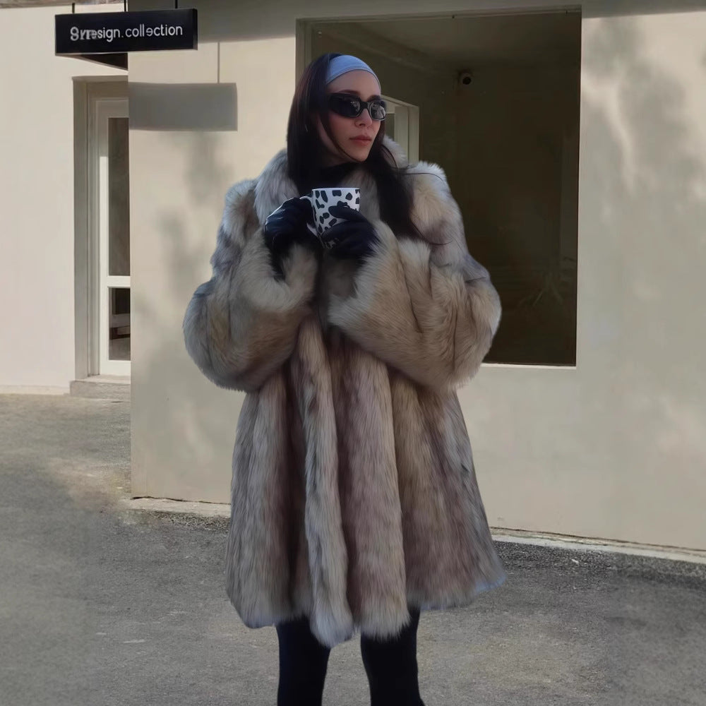 Damer Elegant konstpälsrock med voluminös passform och breda ärmar Mirla-Eva Jonsson