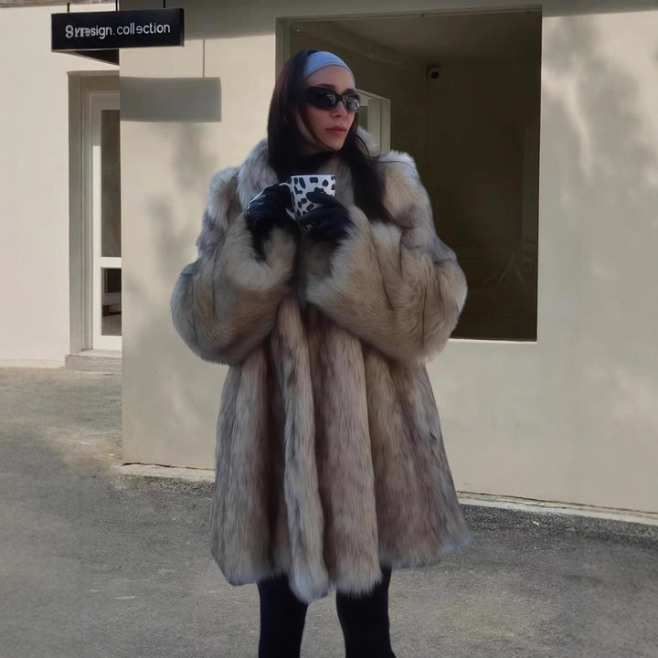 Damer Elegant konstpälsrock med voluminös passform och breda ärmar Mirla-Eva Jonsson