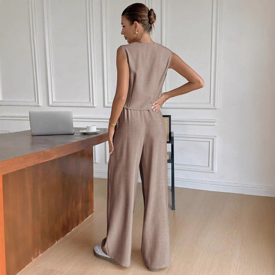 Damer Elegant kostym med ärmlös kavaj och vida byxor Mirla-Eva Jonsson