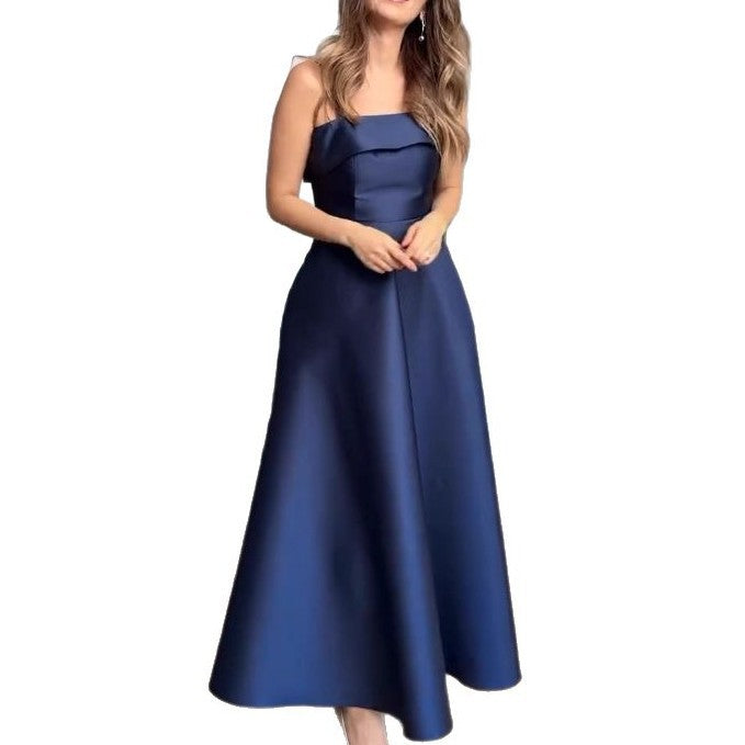 Damer Elegant kvällsklänning med off-shoulder design och voluminös kjol Mirla-Eva Jonsson