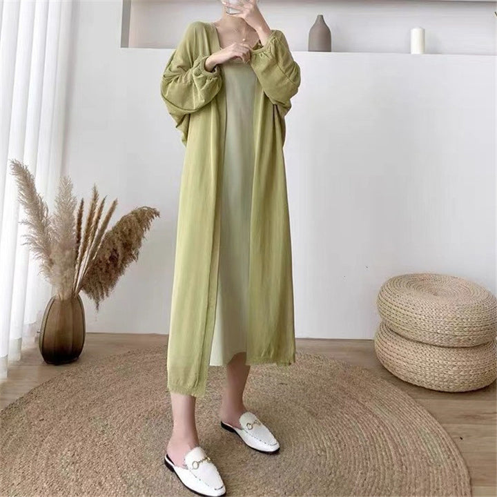 Damer Elegant lång cardigan med ballongformade ärmar och öppen framsida Mirla-Eva Jonsson