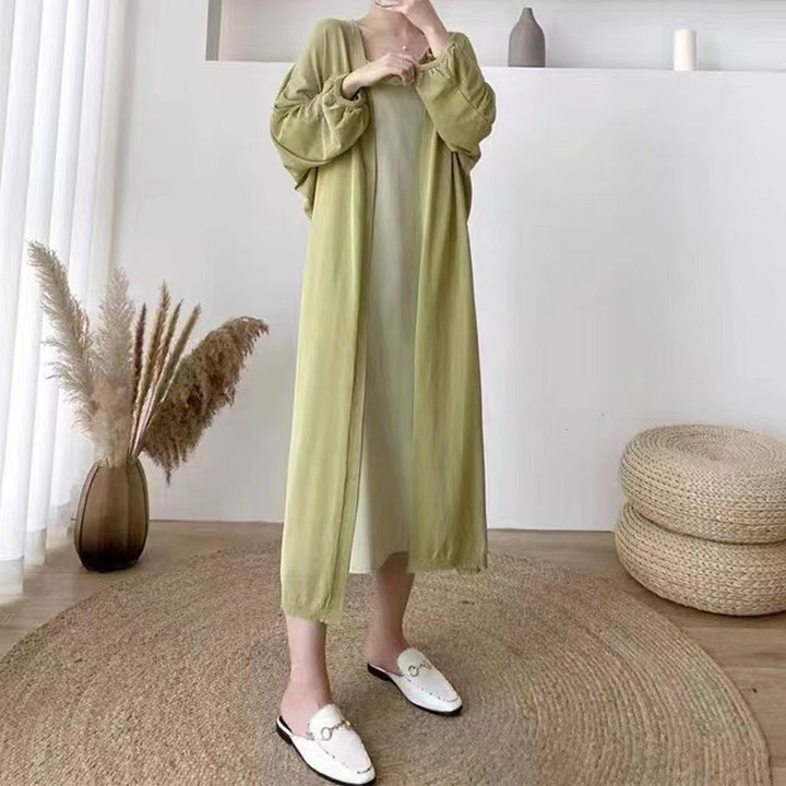 Damer Elegant lång cardigan med ballongformade ärmar och öppen framsida Mirla-Eva Jonsson