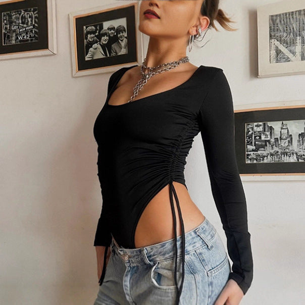 Damer Elegant långärmad bodysuit med rynkade sidodelar och djup utskärning Mirla-Eva Jonsson