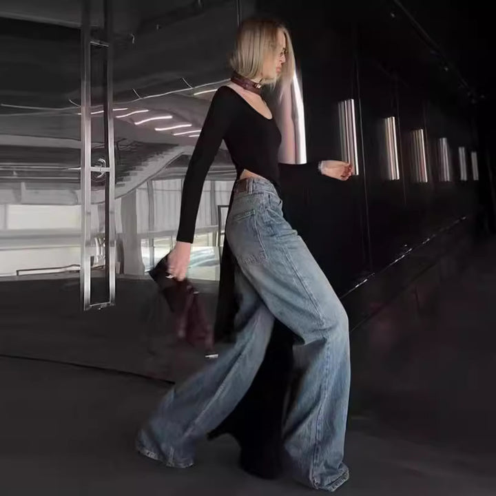 Damer Elegant långärmad klänning med asymmetrisk fåll Mirla-Eva Jonsson