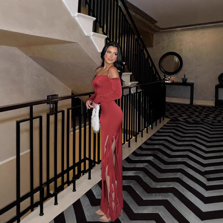 Damer Elegant långärmad maxiklänning med asymmetrisk fåll och volangdetaljer Mirla-Eva Jonsson