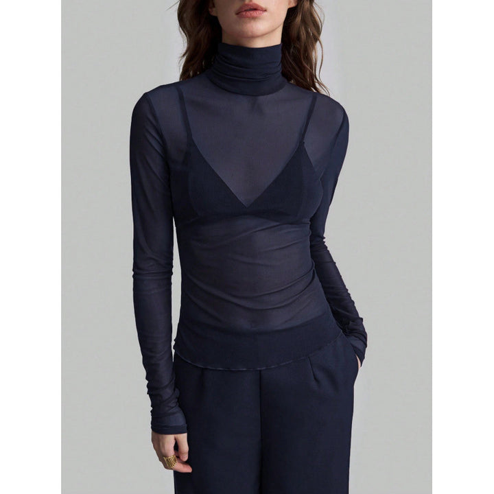 Damer Elegant långärmad transparent topp med hög krage Mirla-Eva Jonsson